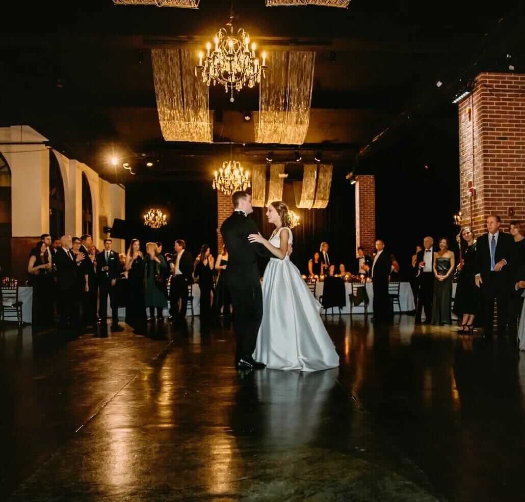 A bride and groom's first dance at their winston-salem wedding venue reception.